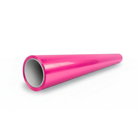 A glossy, bright pink cylindrical tube of Hot Crush Glossy SelfRepair Nano-Coated PPF lies on a white surface, its open end facing the viewer; perfect for ochrana karosérie.