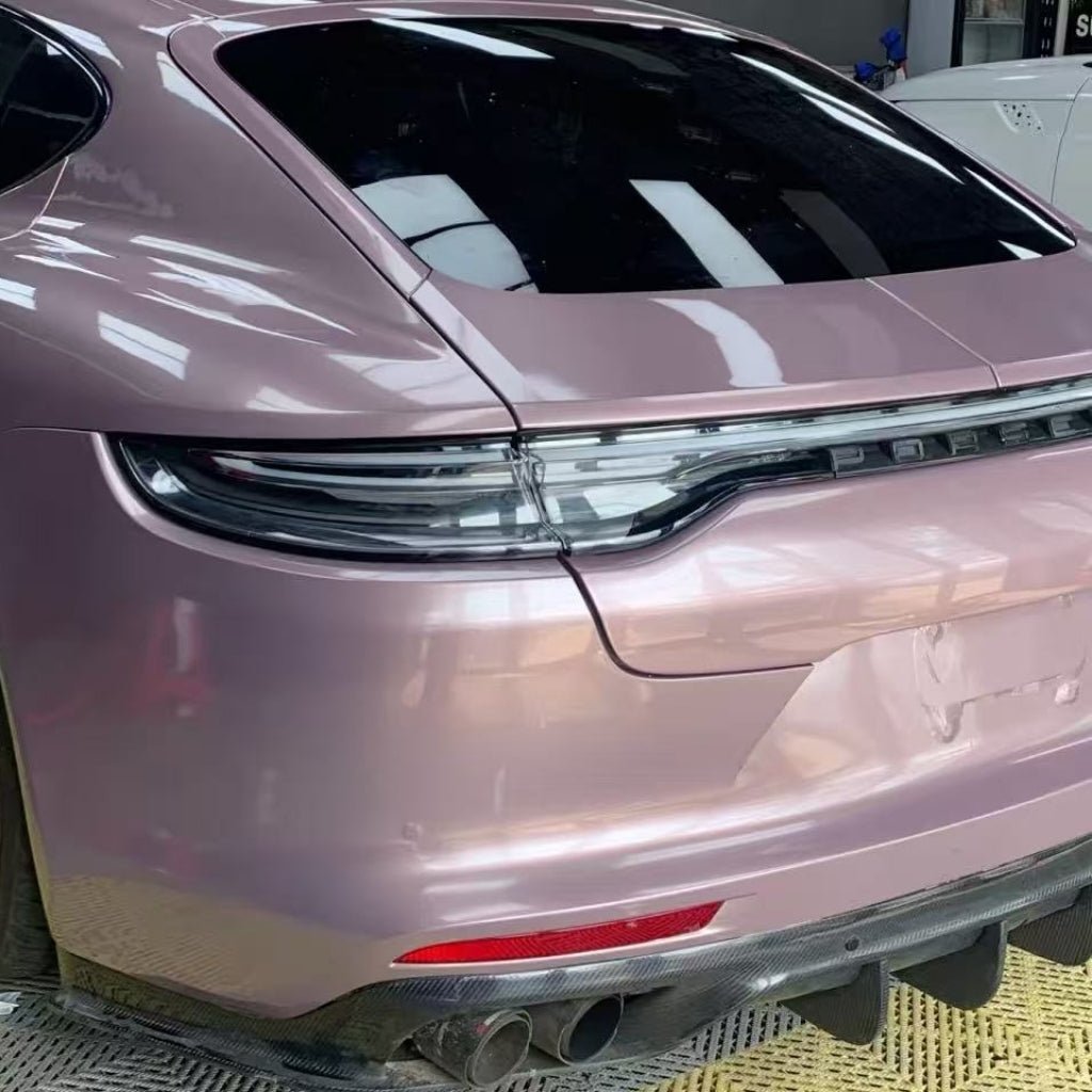 A close-up of a pink luxury sports car’s rear, showcasing sleek taillights and a glossy finish protected by Ice Berry Pink Liquid Metallic Glossy SelfRepair Nano-Coated PPF.