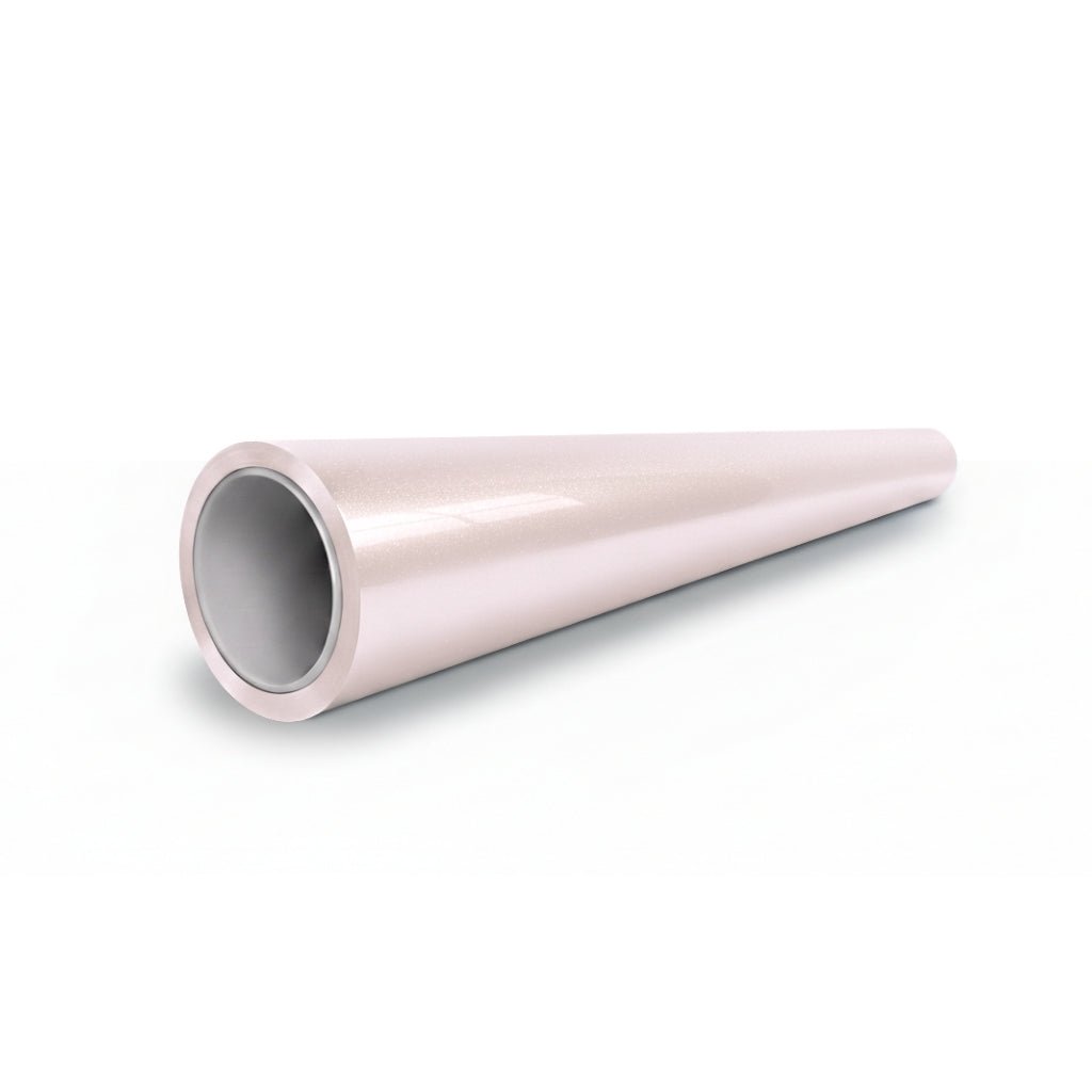 A glossy, light pink metallic tube of Pearl Blossom Pink Glossy SelfRepair Nano-Coated Nexthor™ PPF, wide at one end and tapering to a point, lies on a white background, highlighting the elegant finish of this protective film.