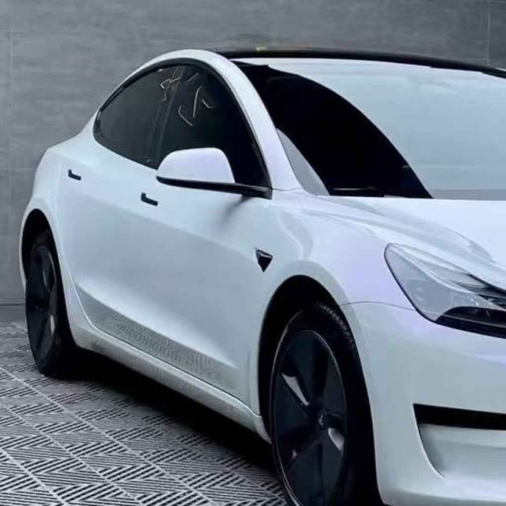 A white car parked in a garage shines with the protection of White Diamond Purple Glossy SelfRepair Nano-Coated PPF.