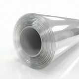 A large roll of Transparent Glossy SelfRepair Nano-Coated PPF is displayed on a white background, with the clear, shiny film tightly wound around a gray inner core.