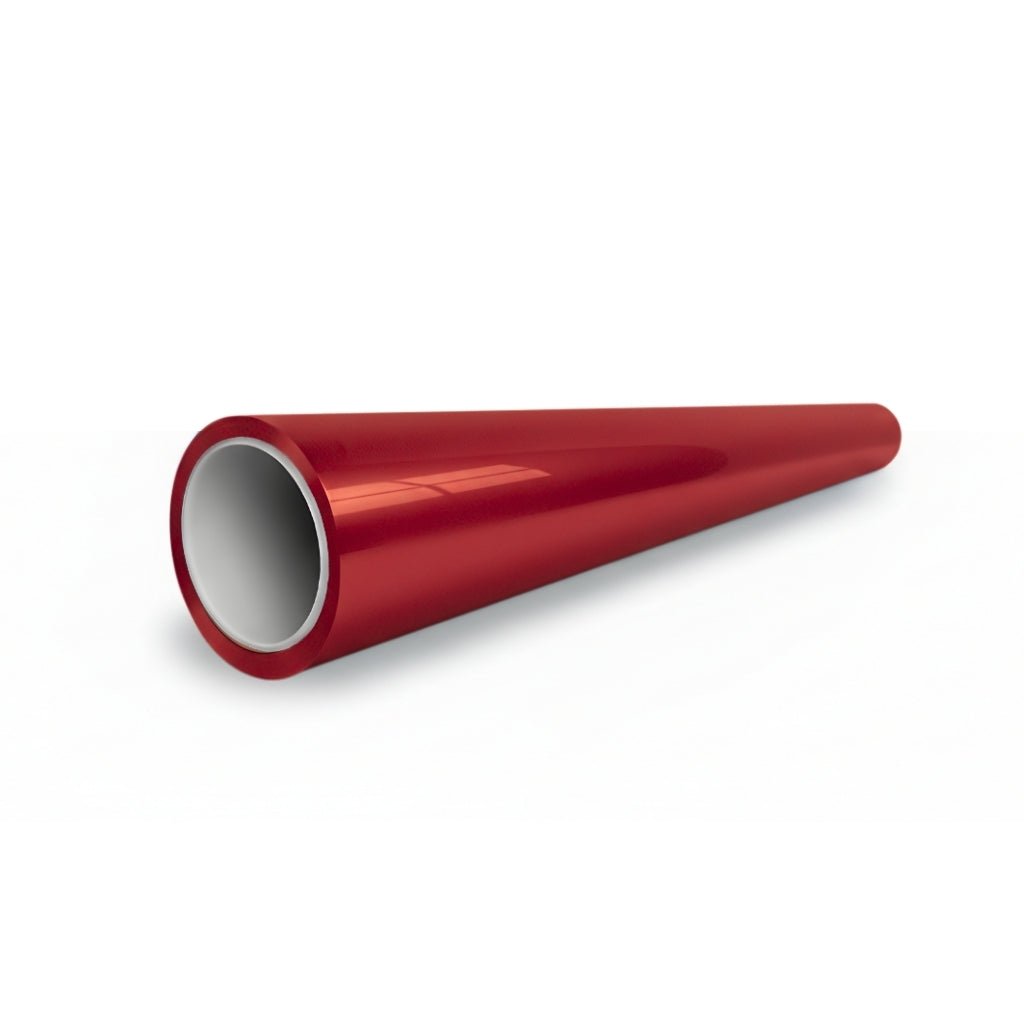A shiny Deep Red Glossy SelfRepair Nano-Coated PPF pipe with a hollow cylindrical shape lies on a white surface, viewed at an angle that highlights its sleek look and protective qualities similar to ochranná fólia na auto.