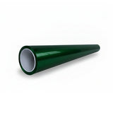 A glossy, dark green cylindrical tube with a white inner lining, featuring Diamond British Green Glossy SelfRepair Nano-Coated PPF, lies diagonally on a plain white background.