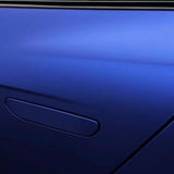 Close-up of a blue car door wrapped in Diamond Blue Matte SelfRepair Nano-Coated PPF, featuring a flush handle and window above. Sleek lines and smooth, reflective paint are protected by this advanced ochranná fólia na auto.