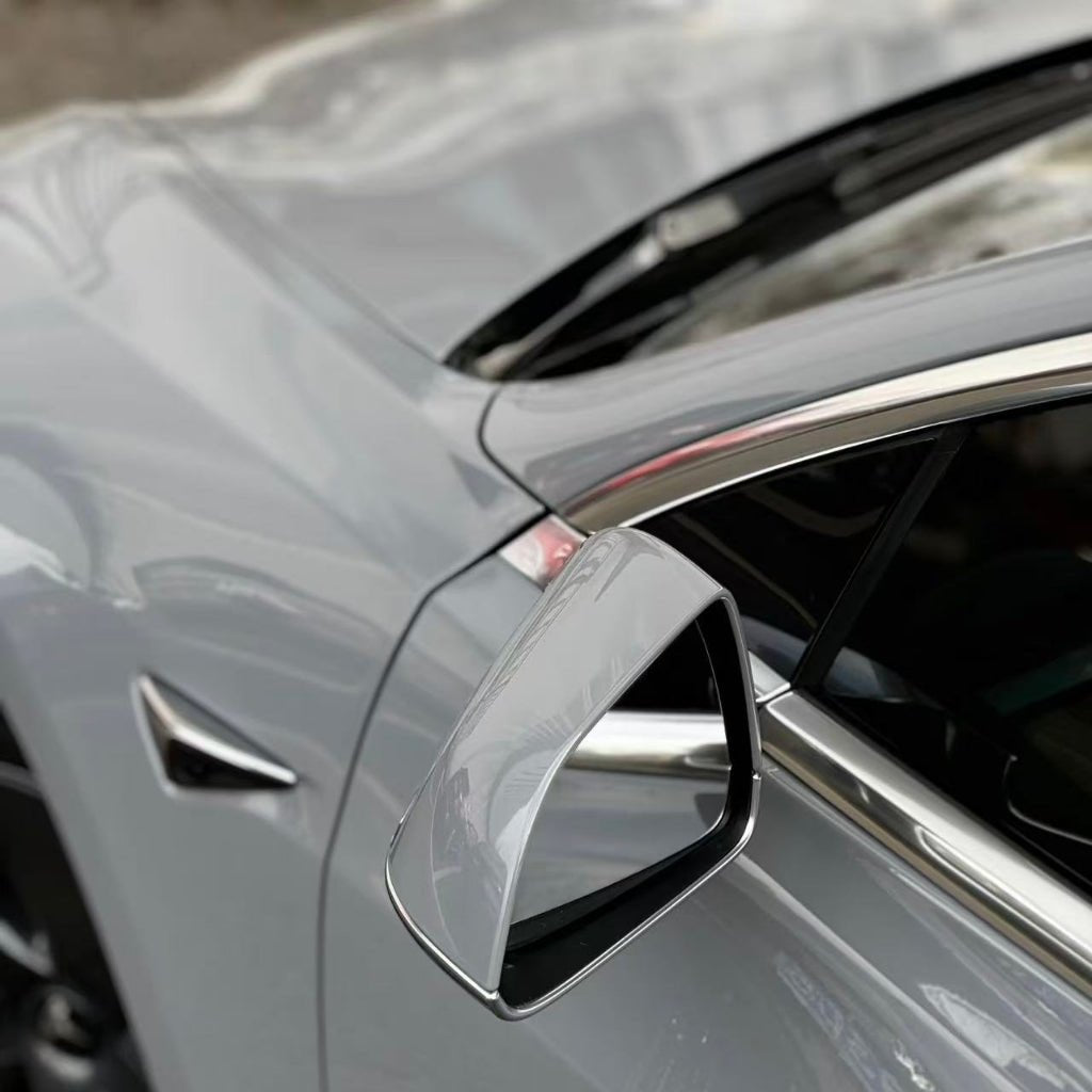 Close-up of a sleek, silver car featuring Nardo Gray Matte SelfRepair Nano-Coated PPF on the side mirror, window, and door. The matte finish enhances its modern design while offering stylish, durable protection.