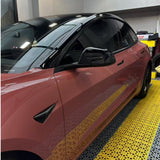 A car parked in a garage, safeguarded by Morganite Red Glossy SelfRepair Nano-Coated PPF for superior body protection and an eye-catching shine.