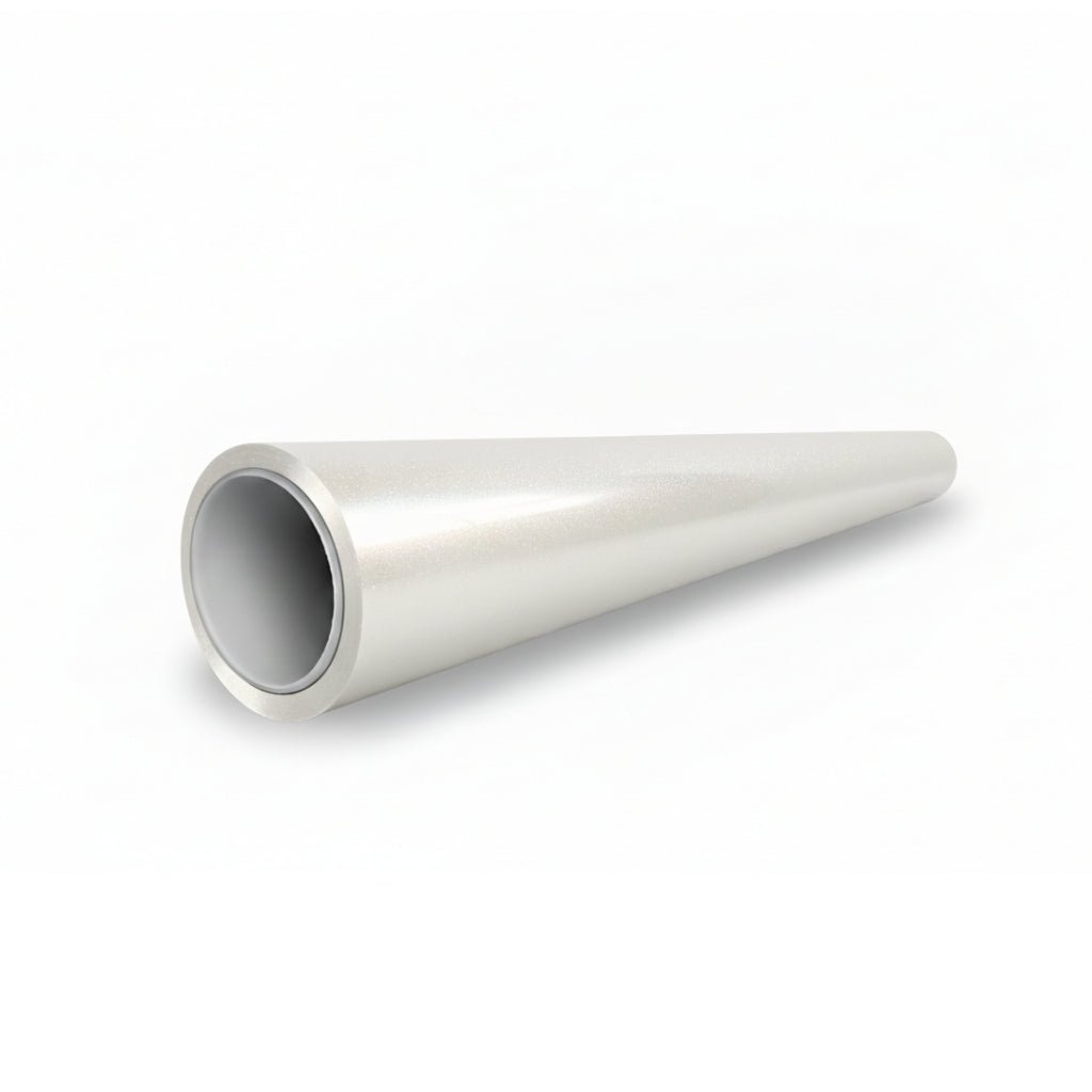 A metallic, silver-colored, hollow cylindrical cone lies on a white surface, its sleek finish resembling that of Shell White Glossy SelfRepair Nano-Coated PPF, tapering from a wide front opening to a narrow point at the back.