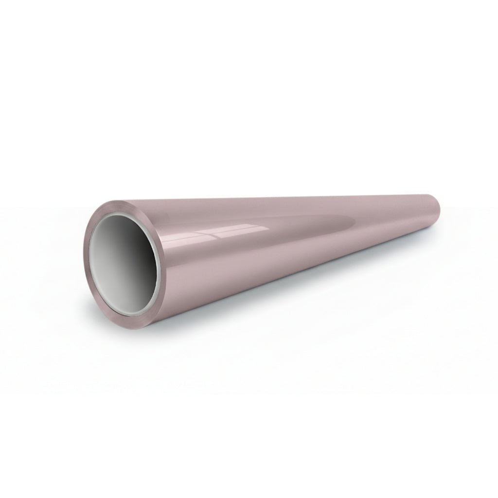A shiny, light pink, hollow cylinder—like Sky Mirror Pink Glossy SelfRepair Nano-Coated PPF—rests on a white surface, with one end wider and open, tapering to a closed narrow tip.