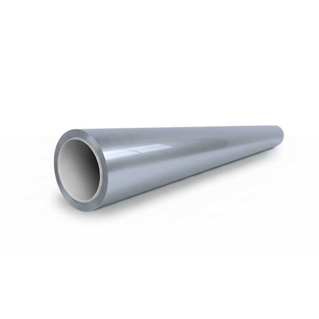 A smooth, metallic cylindrical pipe with a hollow interior lies horizontally on a white surface, its surface gleaming as if protected by Volcano Gray Glossy SelfRepair Nano-Coated PPF.