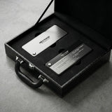 The Nexthor PPF Sample Kit (All Colors) features a black leather case with a metal plate and a rectangular device labeled NEXTHOR, both secured in custom foam cutouts on a gray concrete surface.
